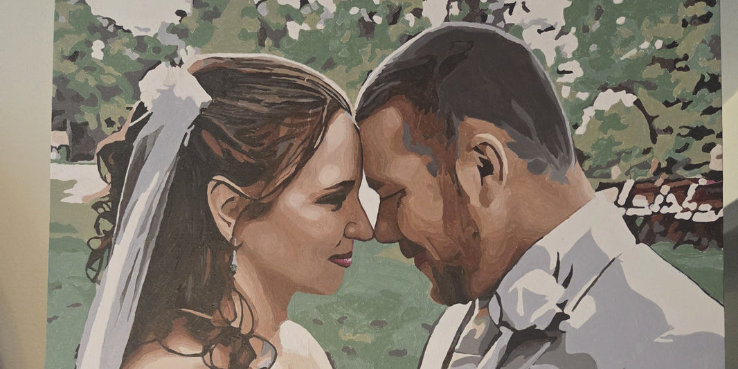 A custom paint by numbers canvas made from a couple's photo, given as an anniversary gift.