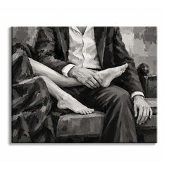 Across a seated man's lap, a woman's bare legs and feet rest over a dark suit, with his hands at her ankle in a black and white couple paint by numbers design of textured gray brushwork.