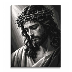 A black and white Jesus paint by numbers design showing rays of light from the upper left falling on a bowed head in a crown of thorns, with long wavy hair and a full beard.
