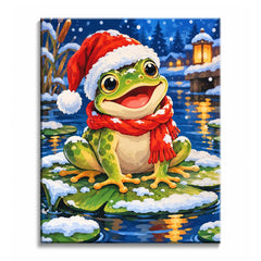 On a snowy lily pad, a Christmas frog in a Santa hat and red scarf fills a paint by numbers design, with warm lantern reflections stretching across the water.