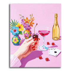 A bold, flat-style paint by numbers scene of a manicured hand holding a cherry beside a pink cocktail, a champagne bottle, dice, and playing cards, with two vases of tropical flowers on a bright pink background.