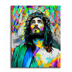 A paint by numbers canvas of Jesus in bold street-art style, crowned with thorns and gazing upward amid neon graffiti splatters on a grey wall.