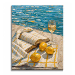 Sunlight falls on an open book, three lemons and a glass of white wine on a checked cloth beside blue water, in a paint by numbers design.