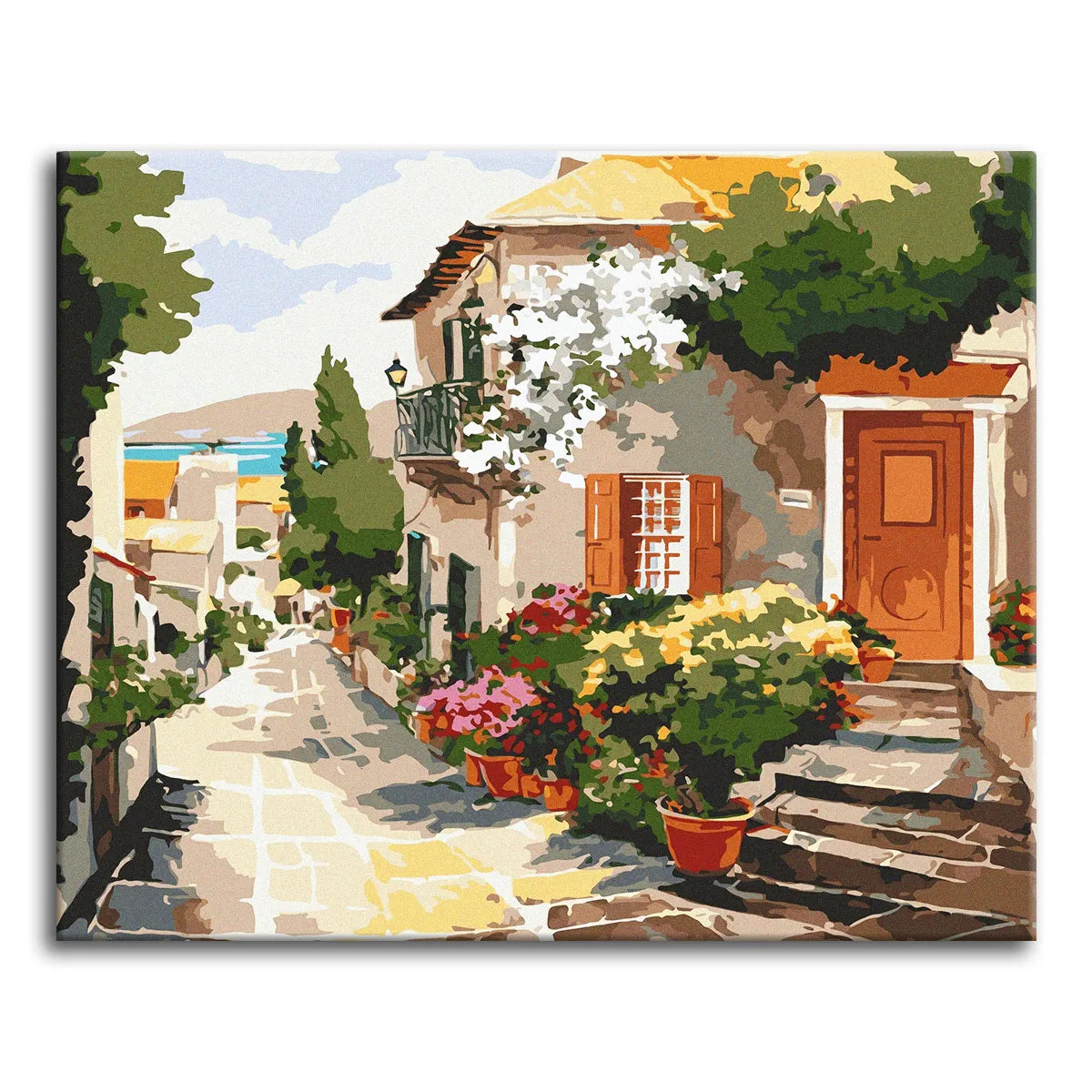 A paint by numbers canvas of a sunlit Mediterranean village lane with cobblestones, potted geraniums, shuttered windows, and a glimpse of blue sea.