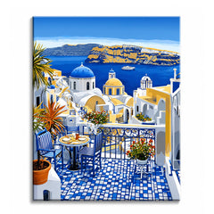 A blue-tiled Santorini terrace set for breakfast overlooking the caldera and blue-domed churches, shown as a paint by numbers canvas.