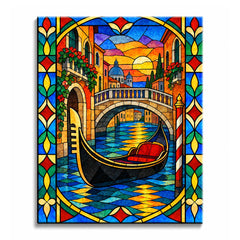 On a Venice canal at sunset, a black gondola rests beneath an arched bridge and warm buildings in a stained glass paint by numbers design across blue-gold canal reflections.