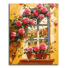 A sunlit window on a golden Tuscan wall framed by climbing pink roses with a view of hills and a village beyond, shown as a paint by numbers canvas.