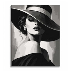Tilting her head under a wide black hat, a woman looks down with closed eyes and parted lips, wearing a pearl earring and an off-shoulder dress, in black and white as a paint by numbers design.