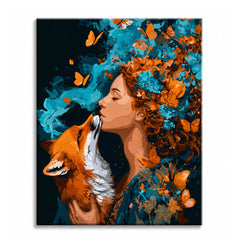 A woman with flowers in her hair leaning down to a fox reaching up toward her, in burnt orange and deep teal, shown as a paint by numbers canvas.